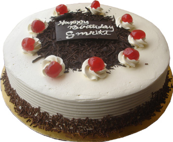 (27) 4.4 Pounds Black Forest Round Cake