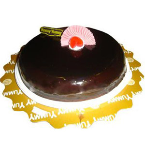 Half kg Chocolate Ribbon round shape cake