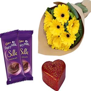 Flowers W/ chocolates & candle