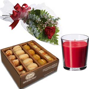 sweets W/ red rose & candle