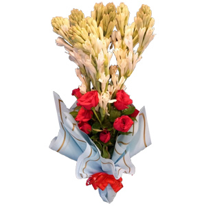 Rajhanighandha with red roses in a bouquet