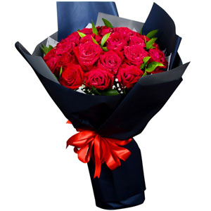 2 dozen red roses in a bouquet