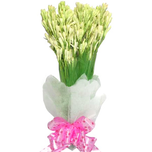 Two dozen Rajanigandha in a Bouquet