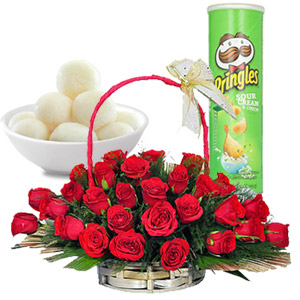Red roses in basket with sweet and chips