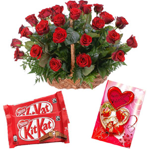 Roses in basket with chocolate and card