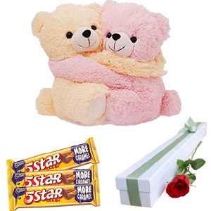 Bear with chocolate and rose