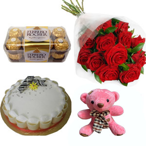 (32) Cake W/ red roses, chocolates & teddy bear